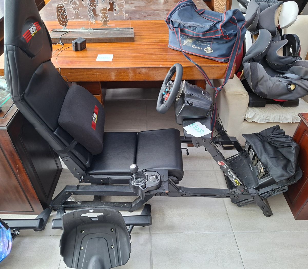 Next Level Racing Simulator Cockpit with Logitech G29 Steering Wheel & Pedals