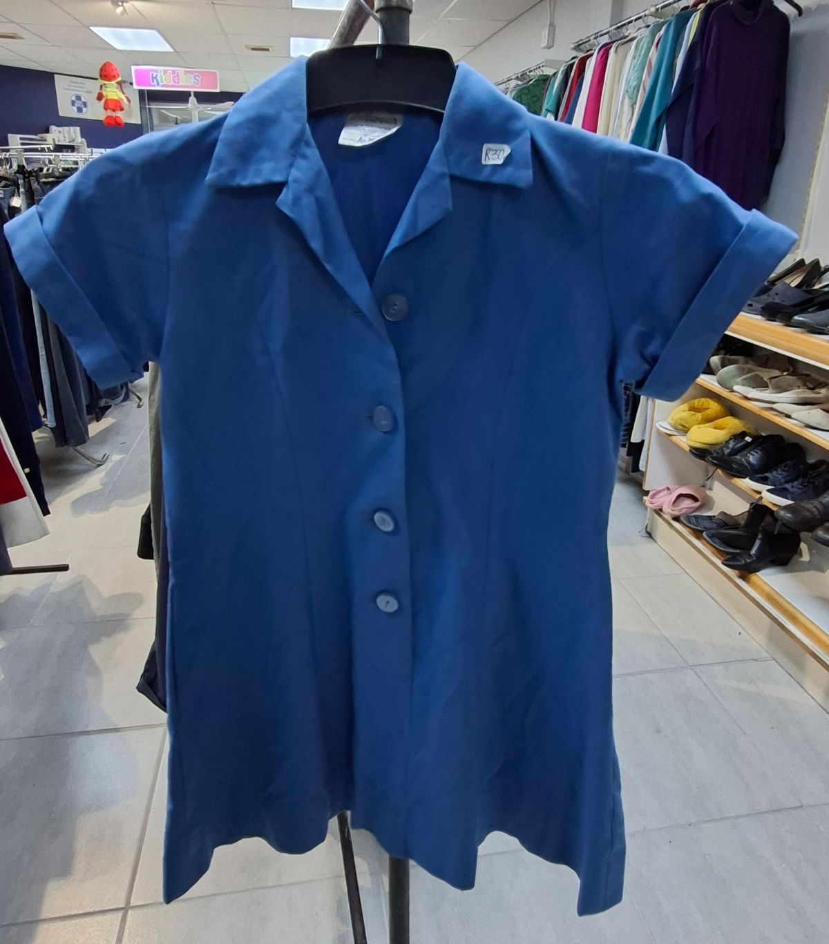 Various sizes and styles of girls’ school uniforms 8