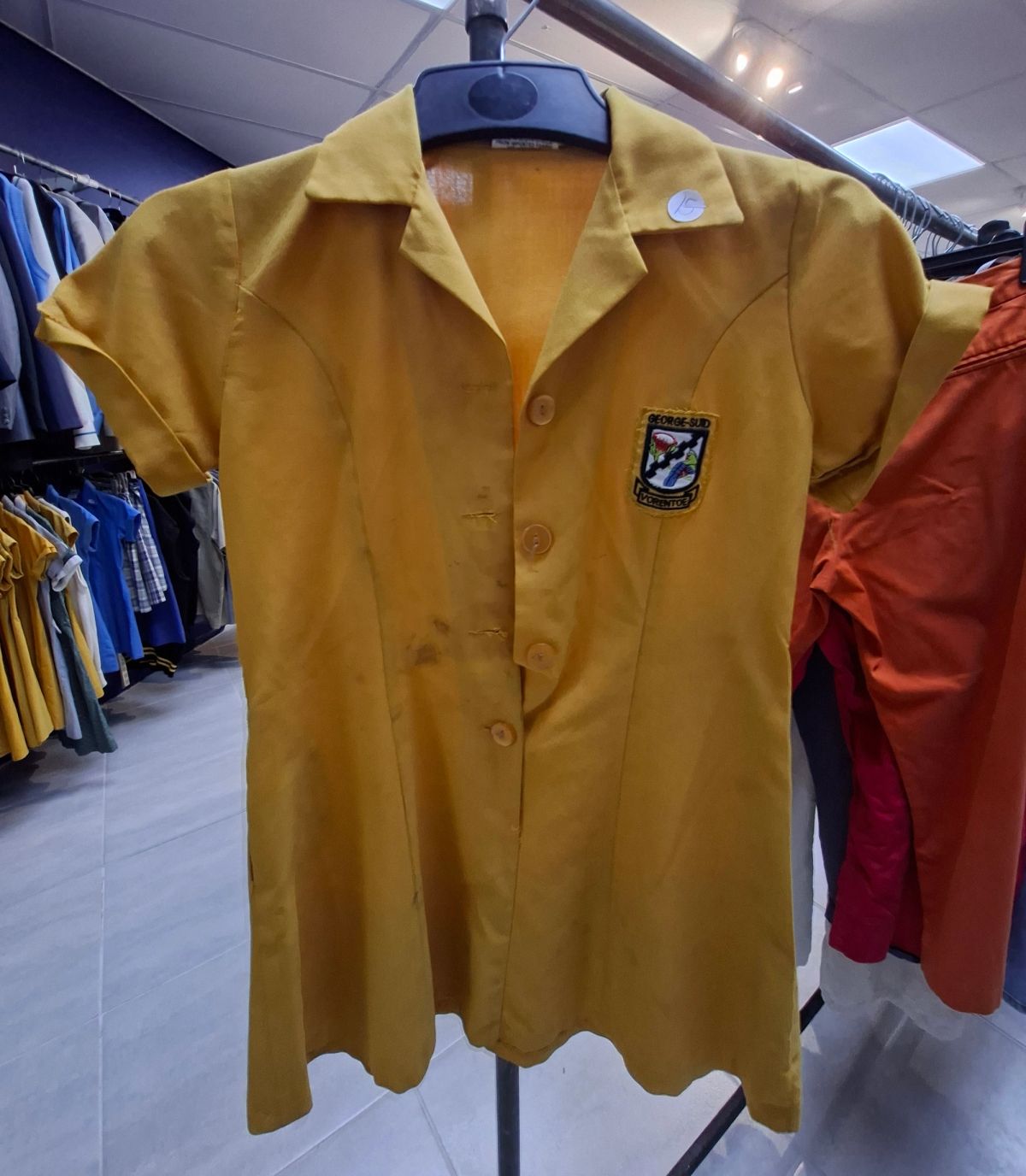 Various sizes and styles of girls’ school uniforms 4