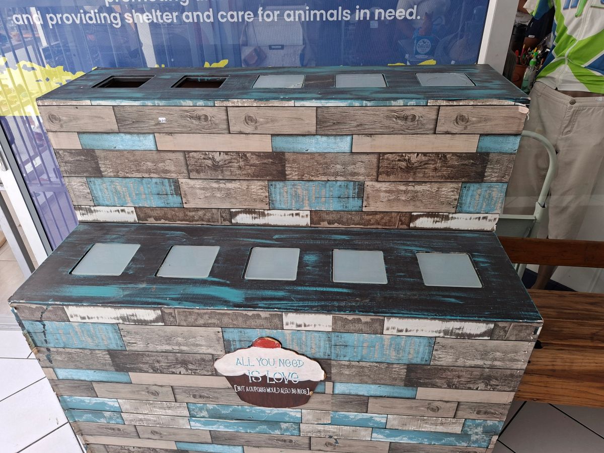 Rustic wooden display/storage unit with a distressed grey, brown and turquoise finish 2