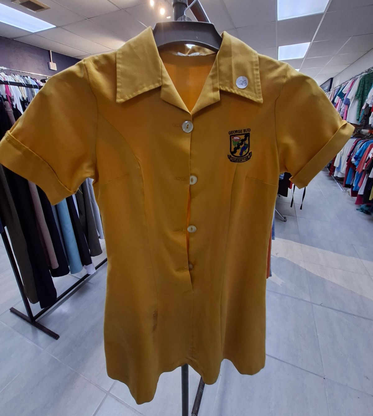 Various sizes and styles of girls’ school uniforms 2