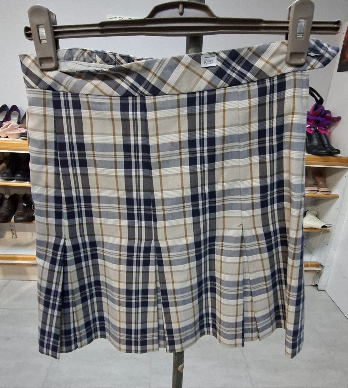 Various sizes and styles of girls’ school uniforms 10