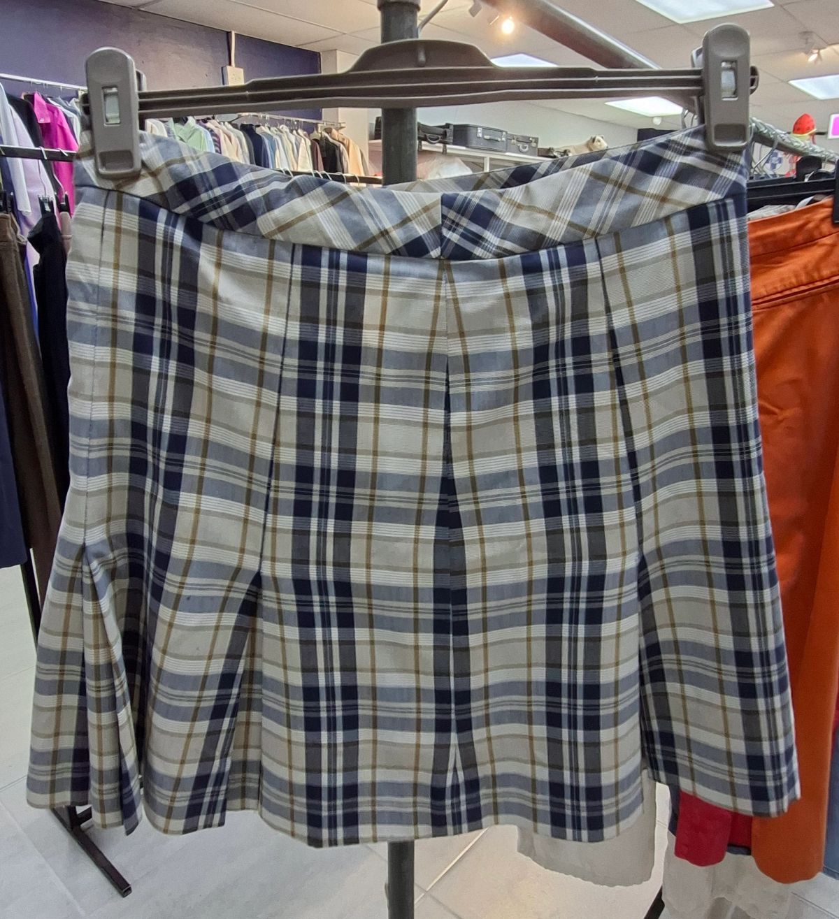 Various sizes and styles of girls’ school uniforms 11