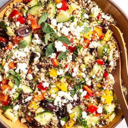 Mediterranean Quinoa Salad with Peppers, Cucumbers, Olives and Feta