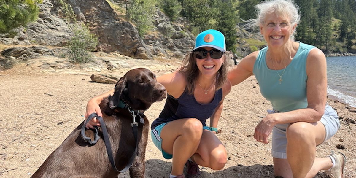My mom, my chocolate lab, and me on the beach for my first hike of the season!