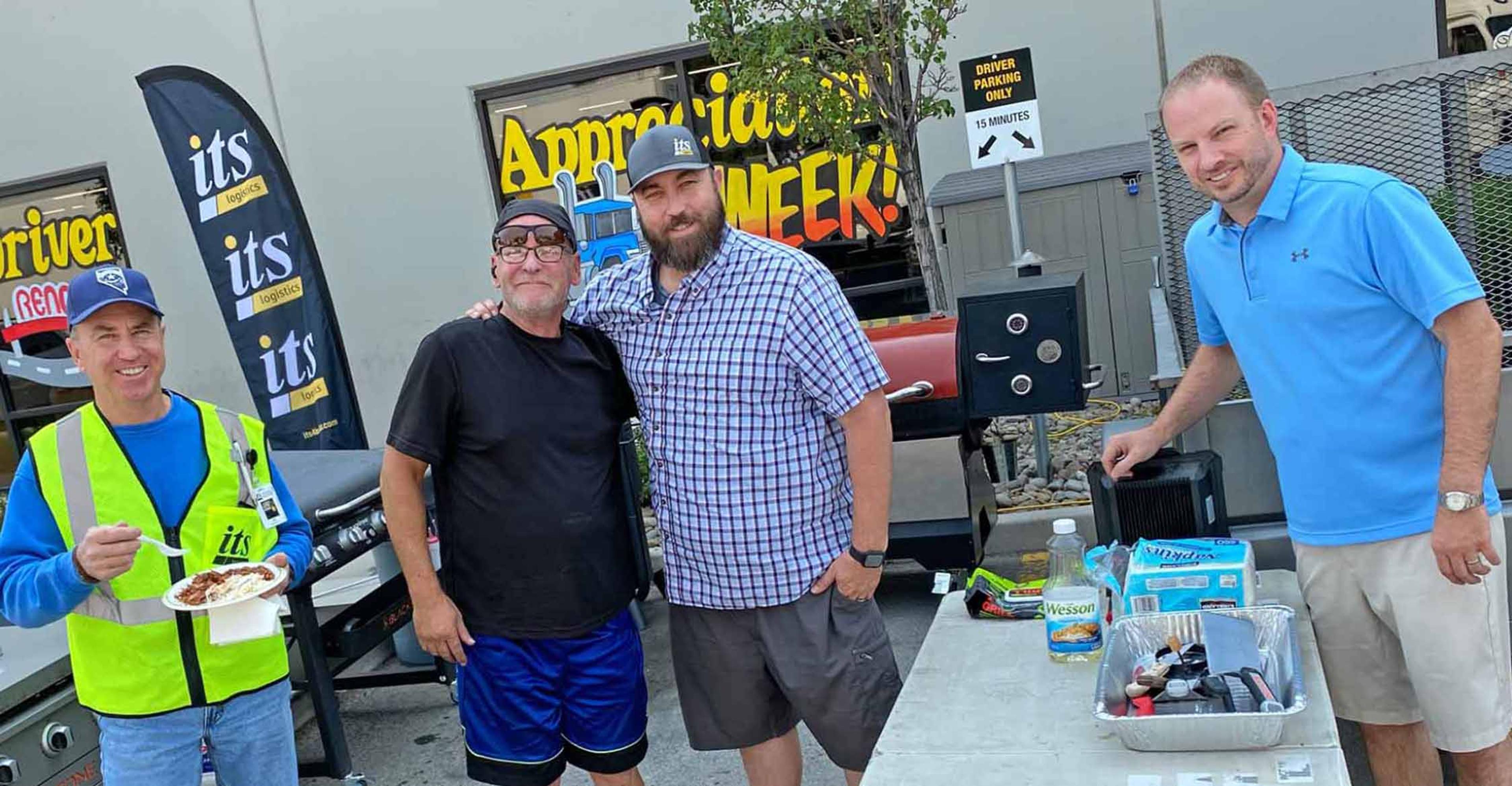 A group of ITS team members hanging out at a driver appreciation BBQ