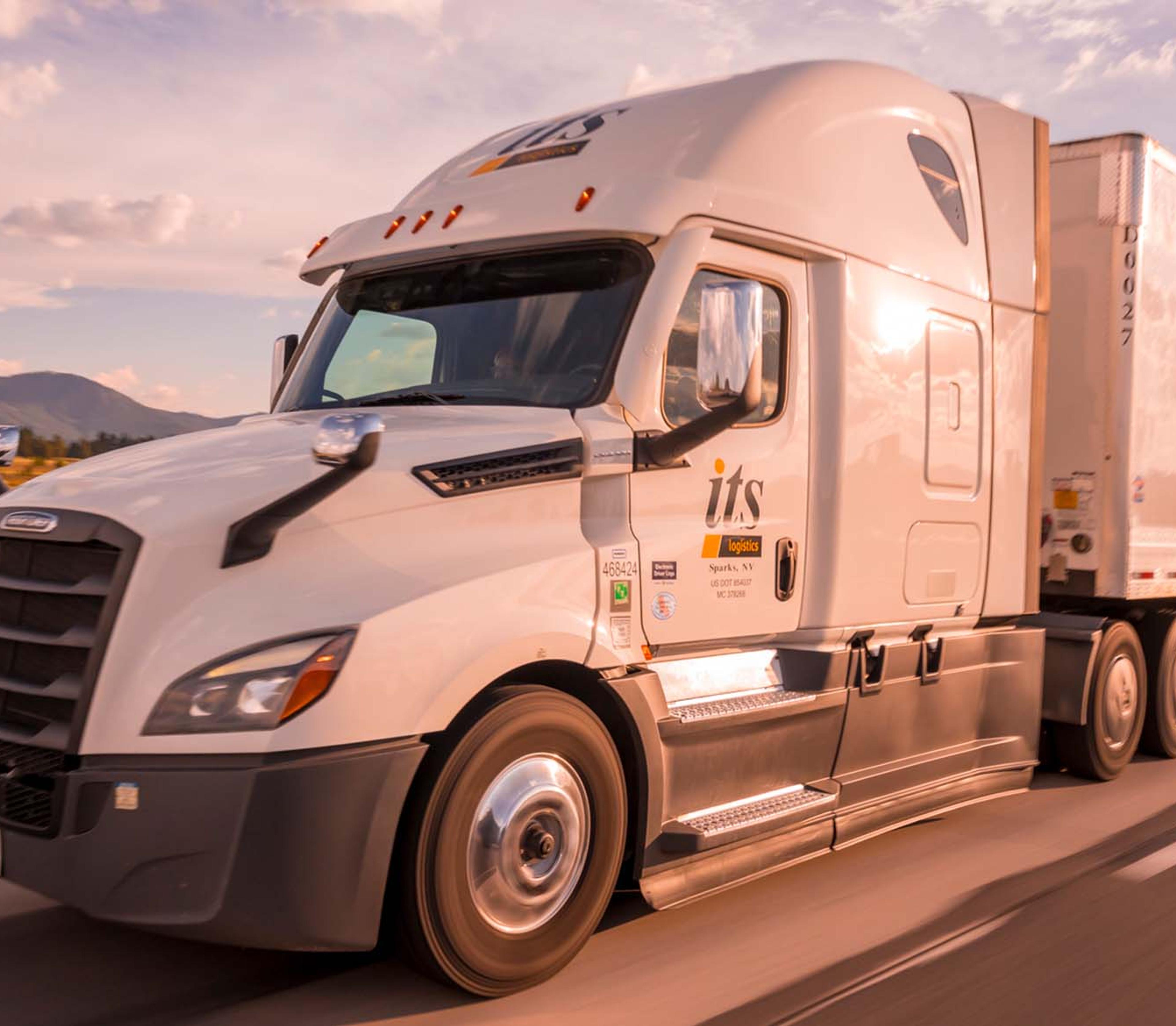 An ITS truck driving down the interstate