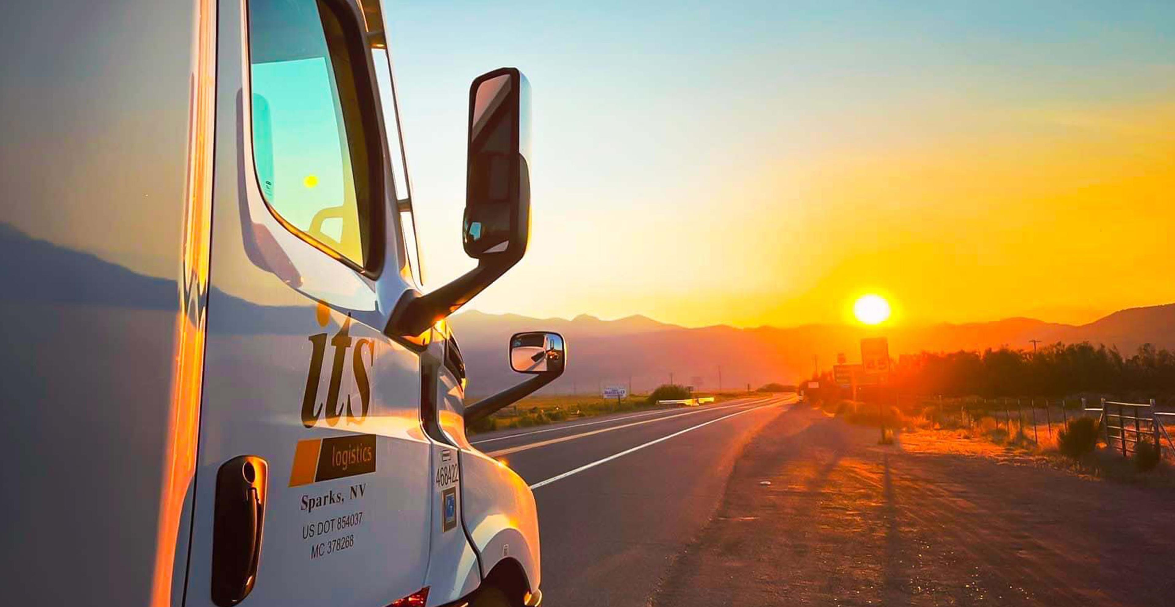 An ITS truck parked on the highway shoulder