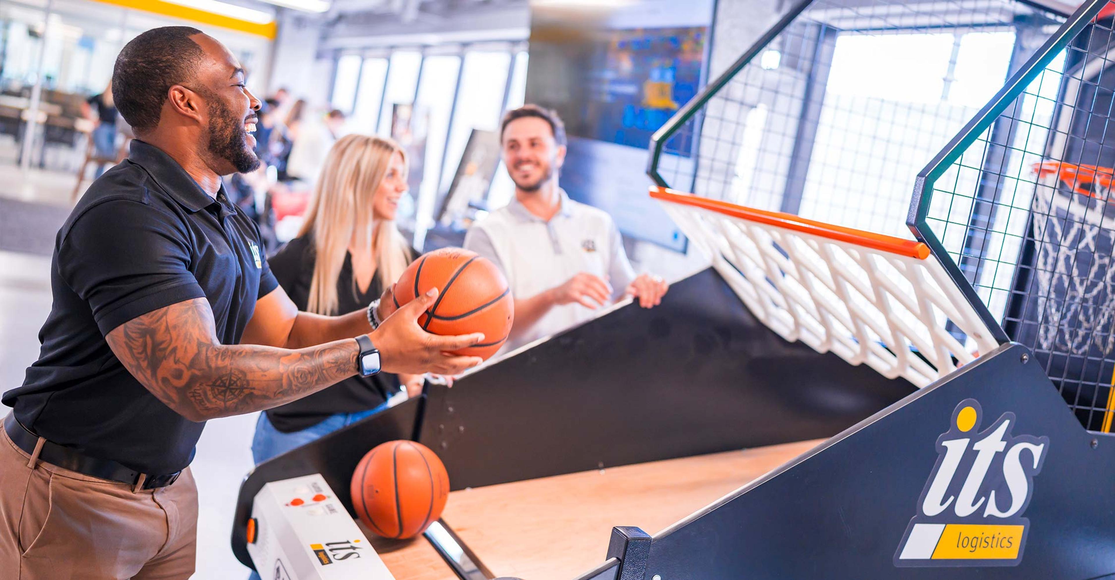 ITS Logistics employee playing basketball