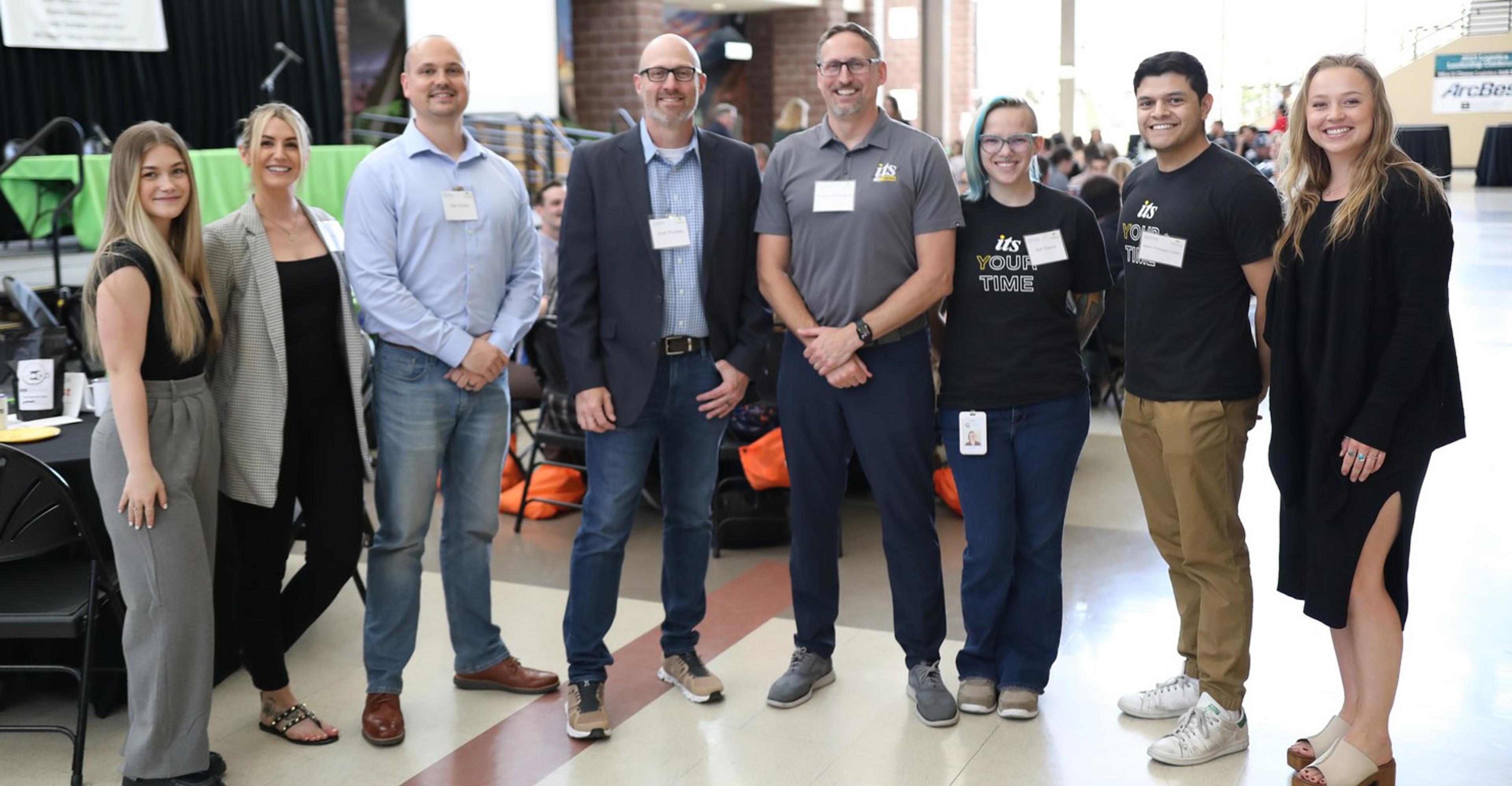 8 ITS Logistics employees at the Logistics Conference at TMCC.