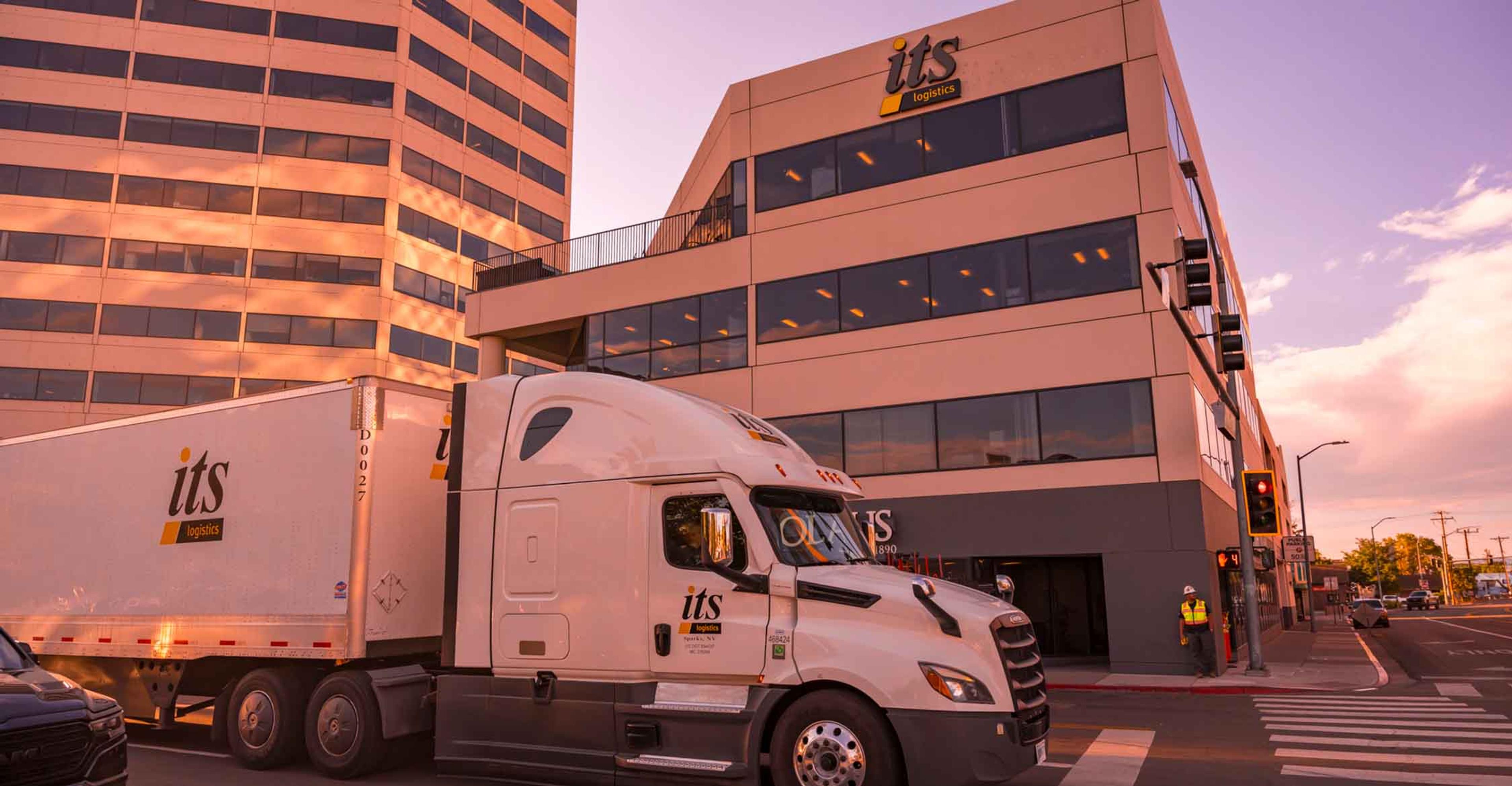 ITS Semi Truck on the street next to ITS office building