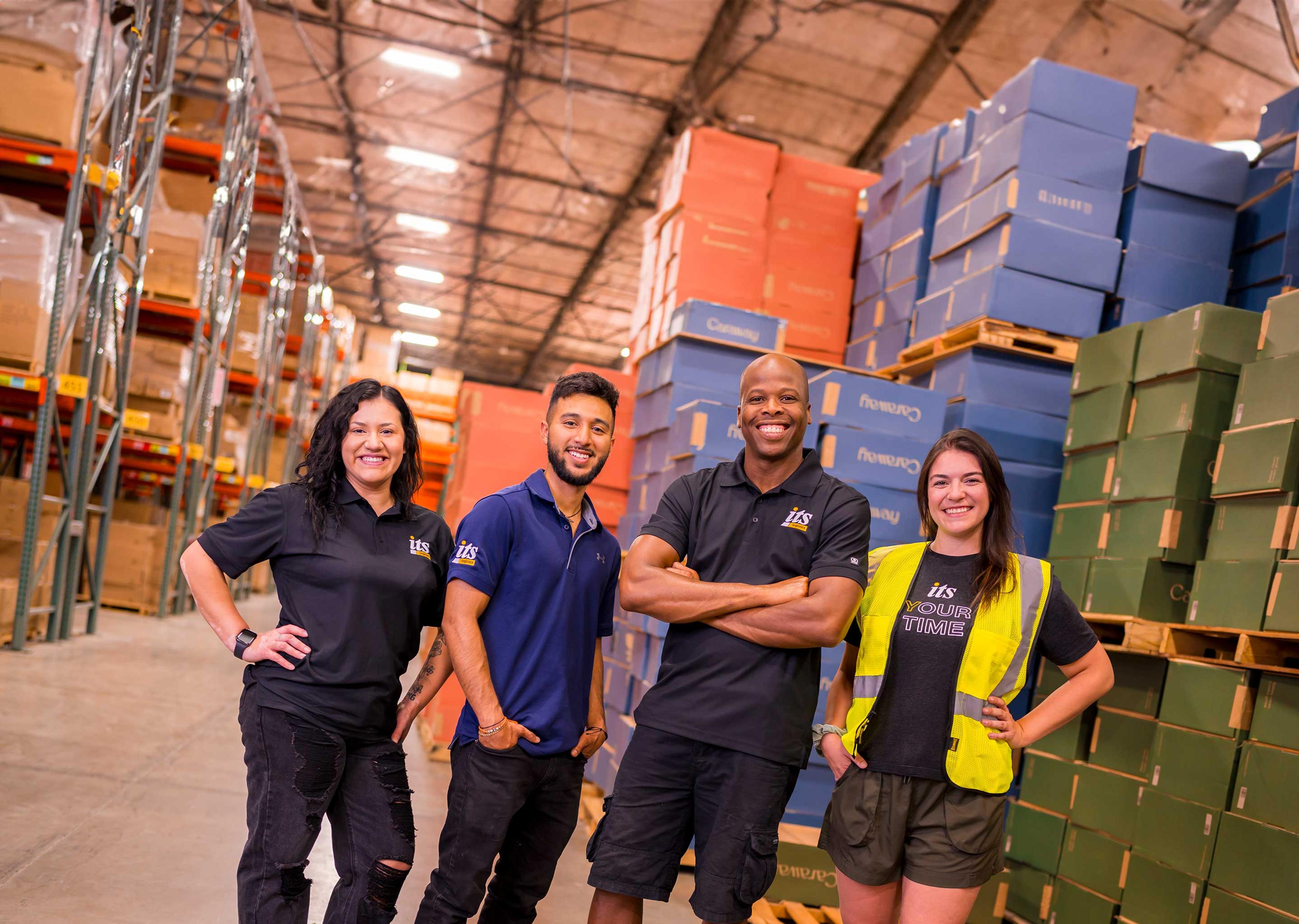 4 team members in vista warehouse