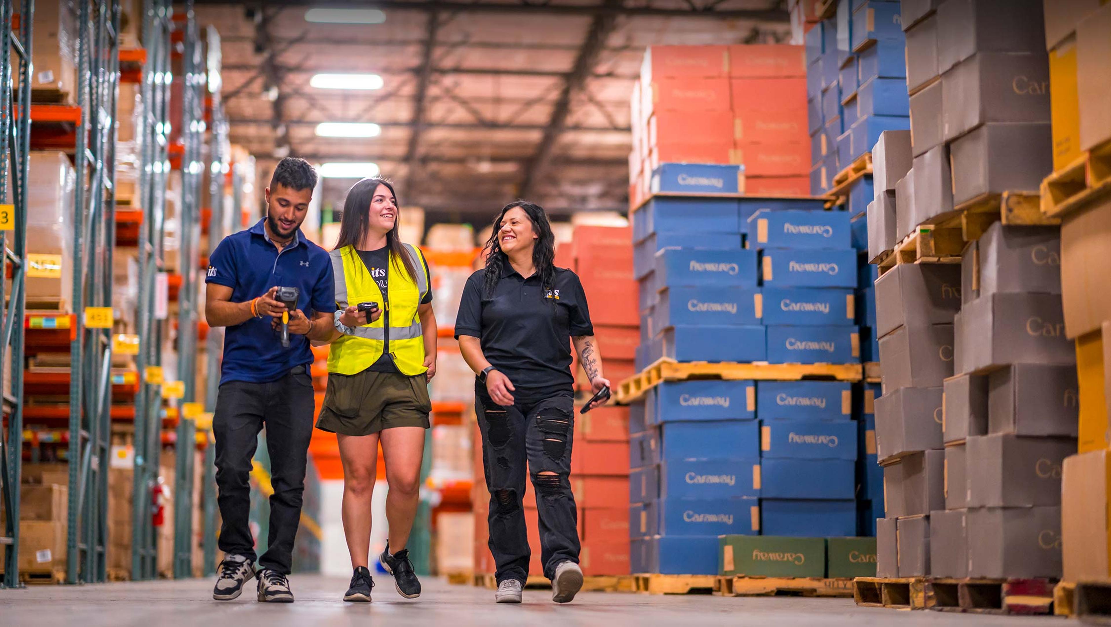 three employees checking retail distribution