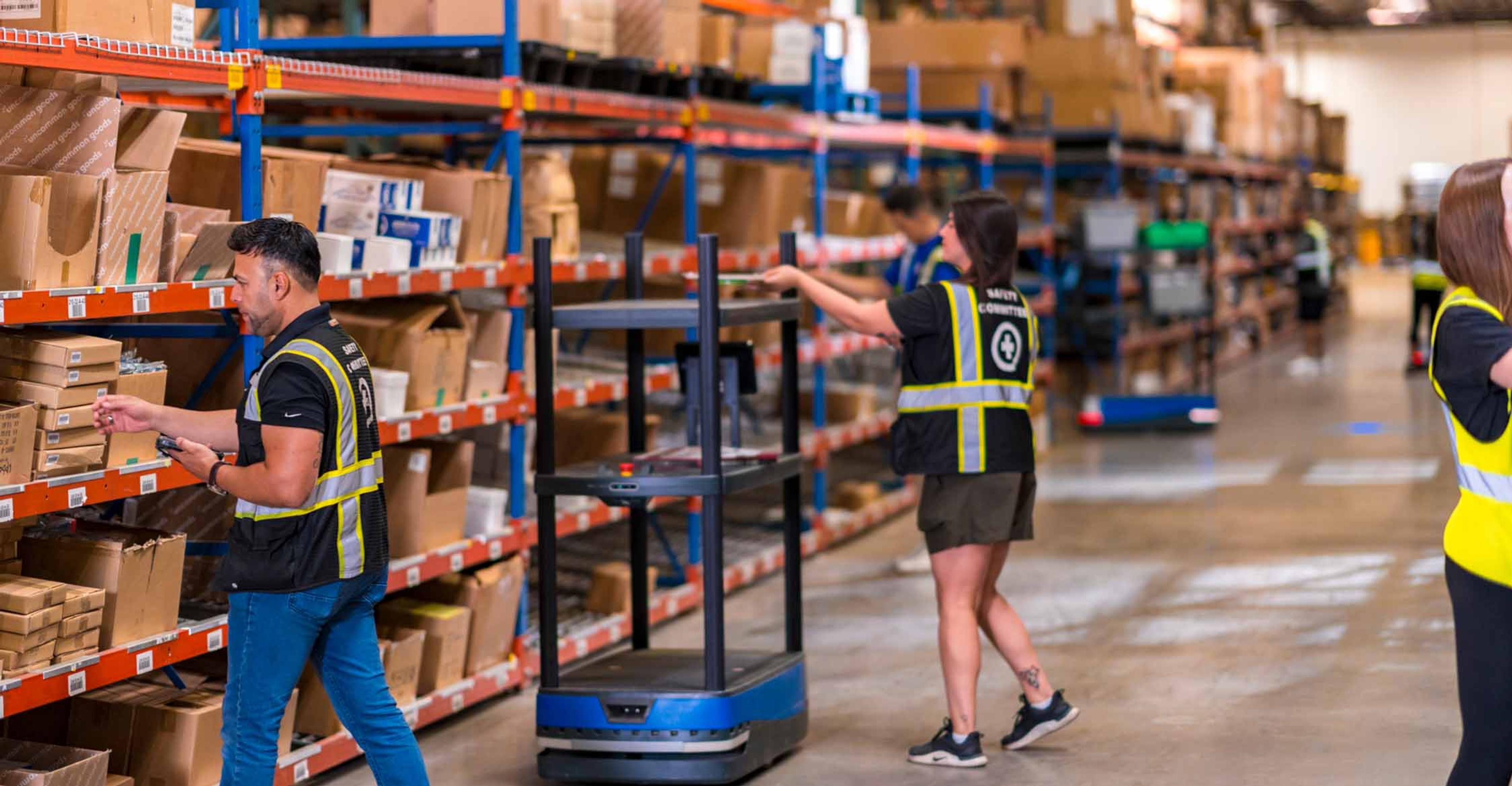 Warehouse employees packing orders.