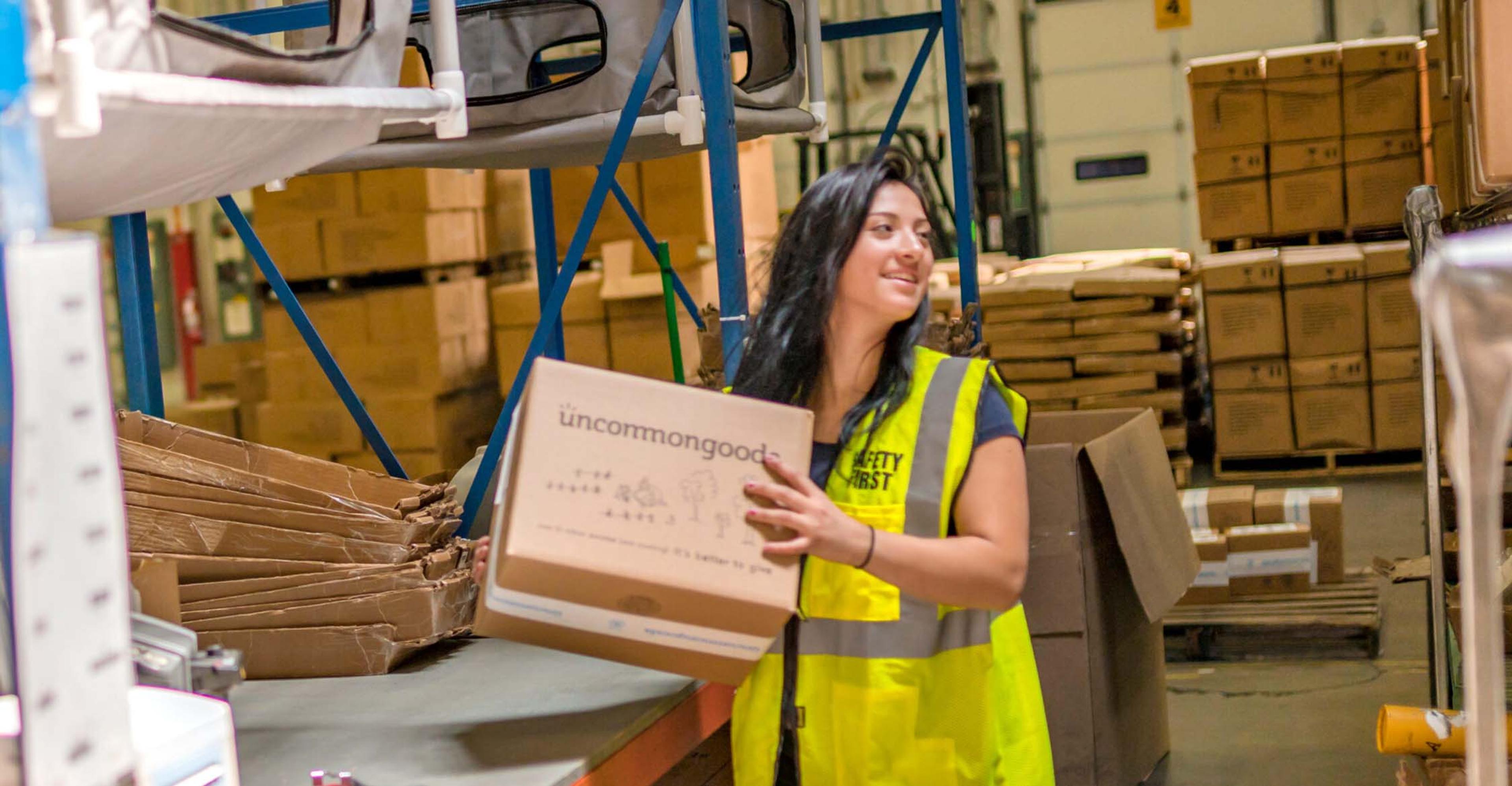 An ITS team member working at a packing station