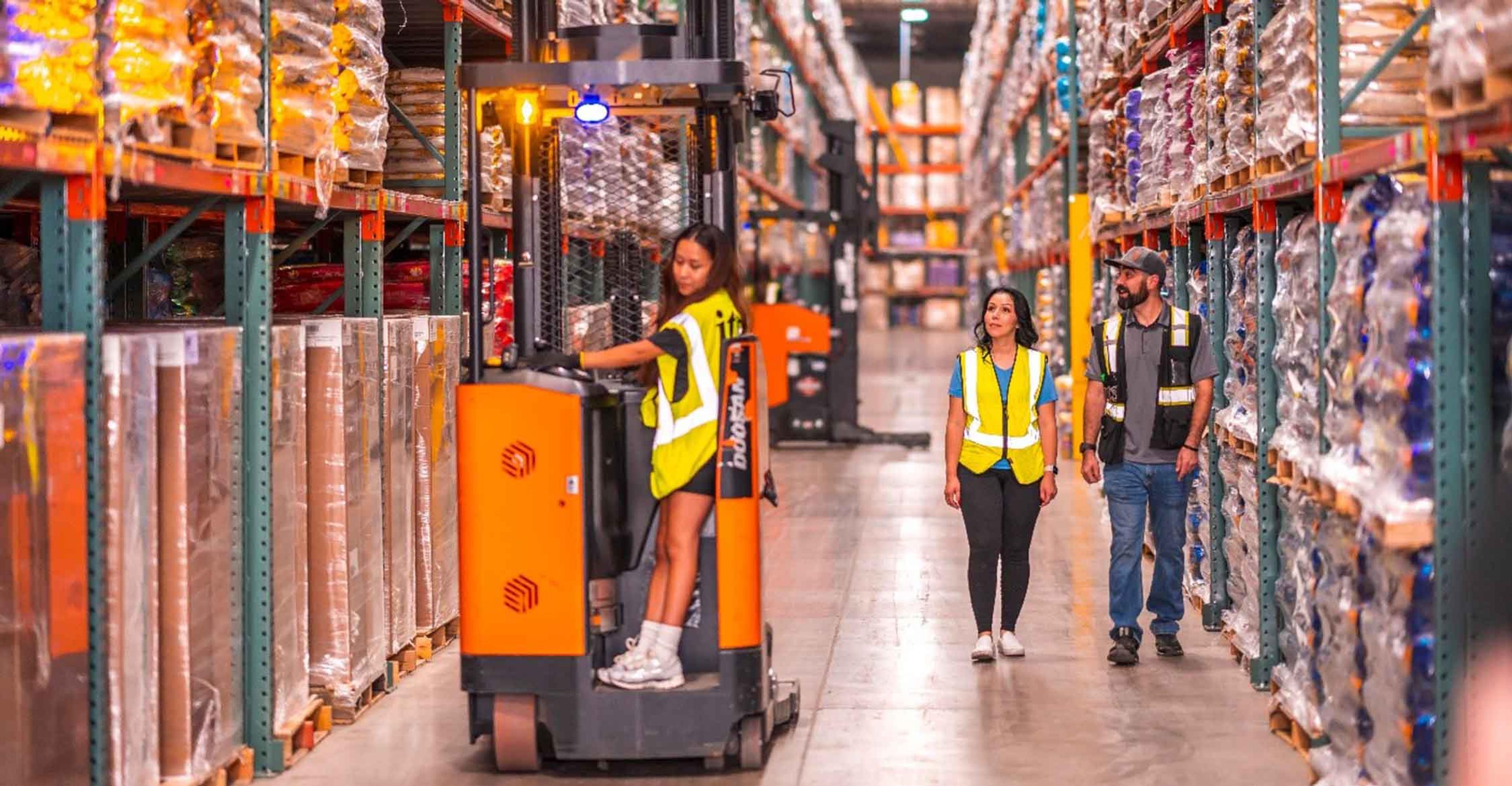 ITS team members working in a warehouse