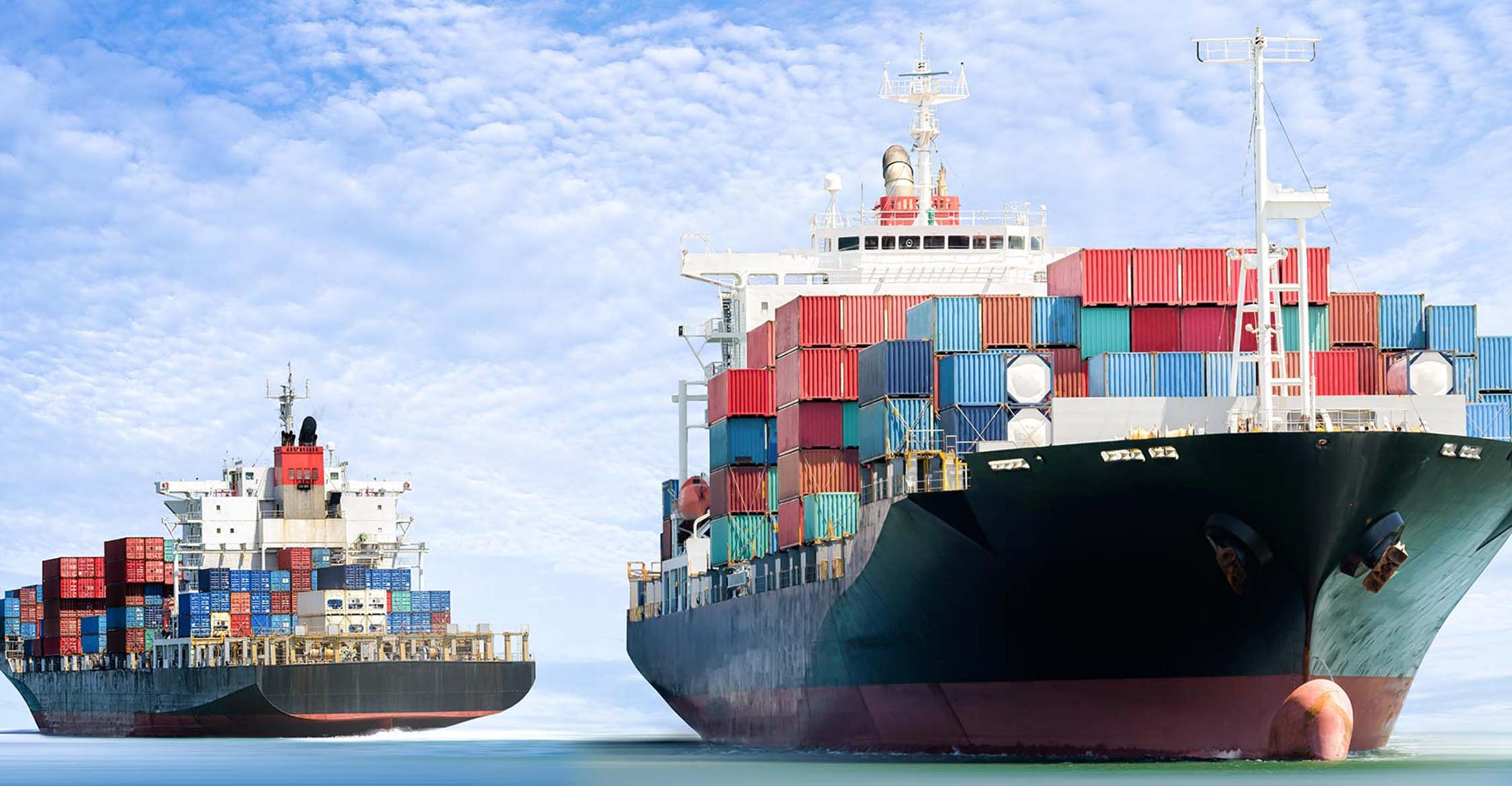 Ocean vessels loaded with containers