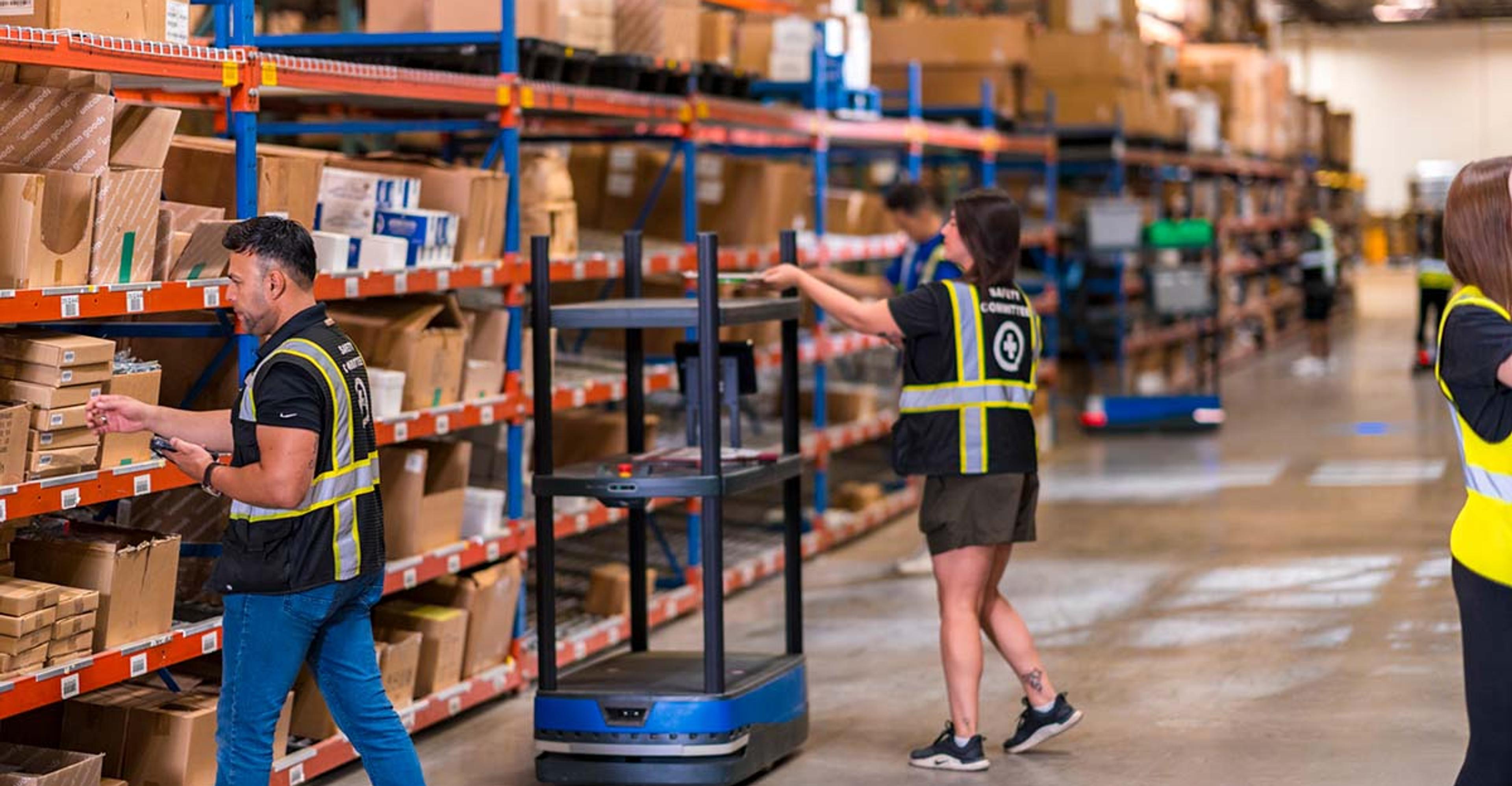 Warehouse employees packing orders.