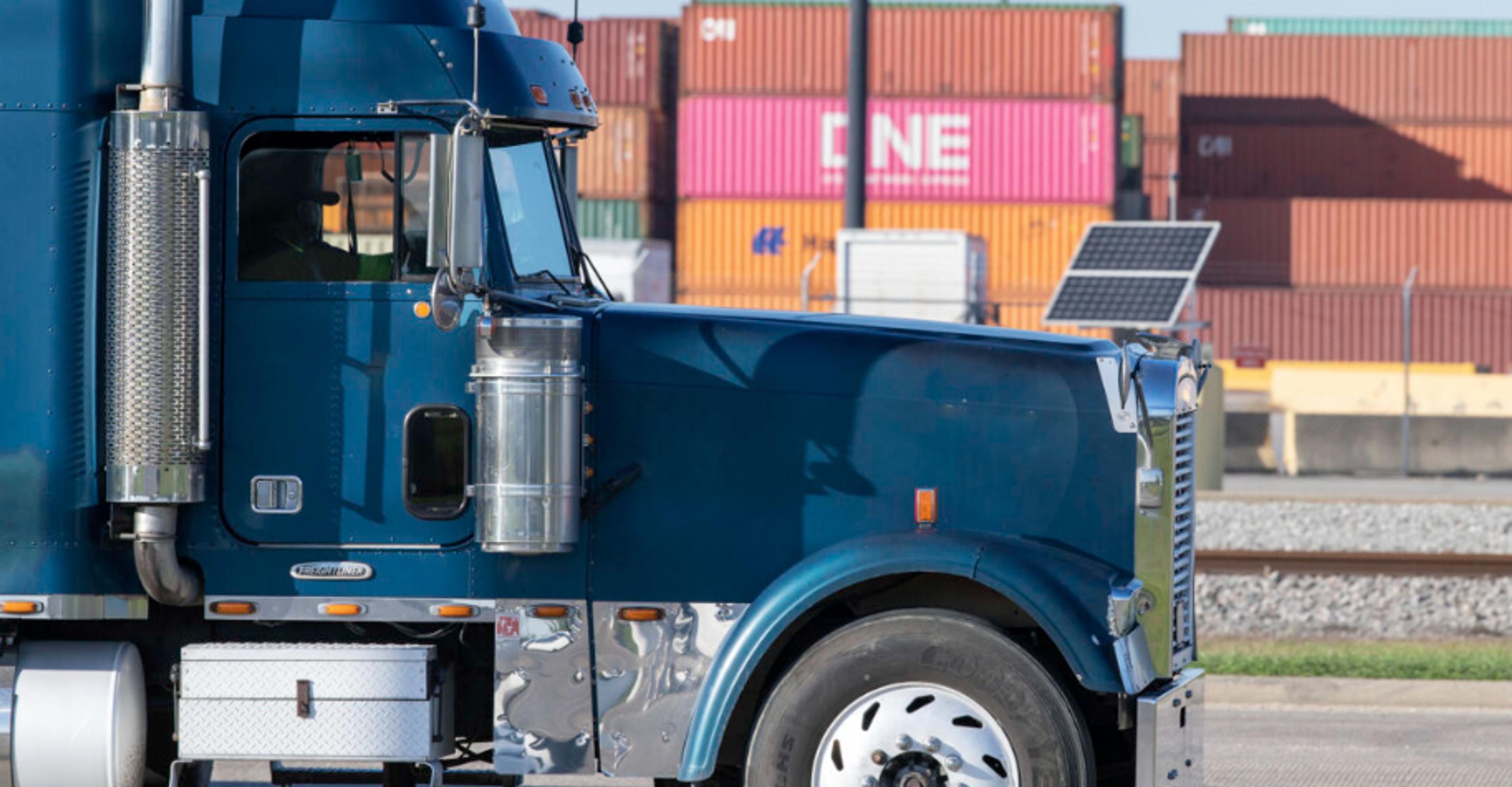 blue semi truck parked