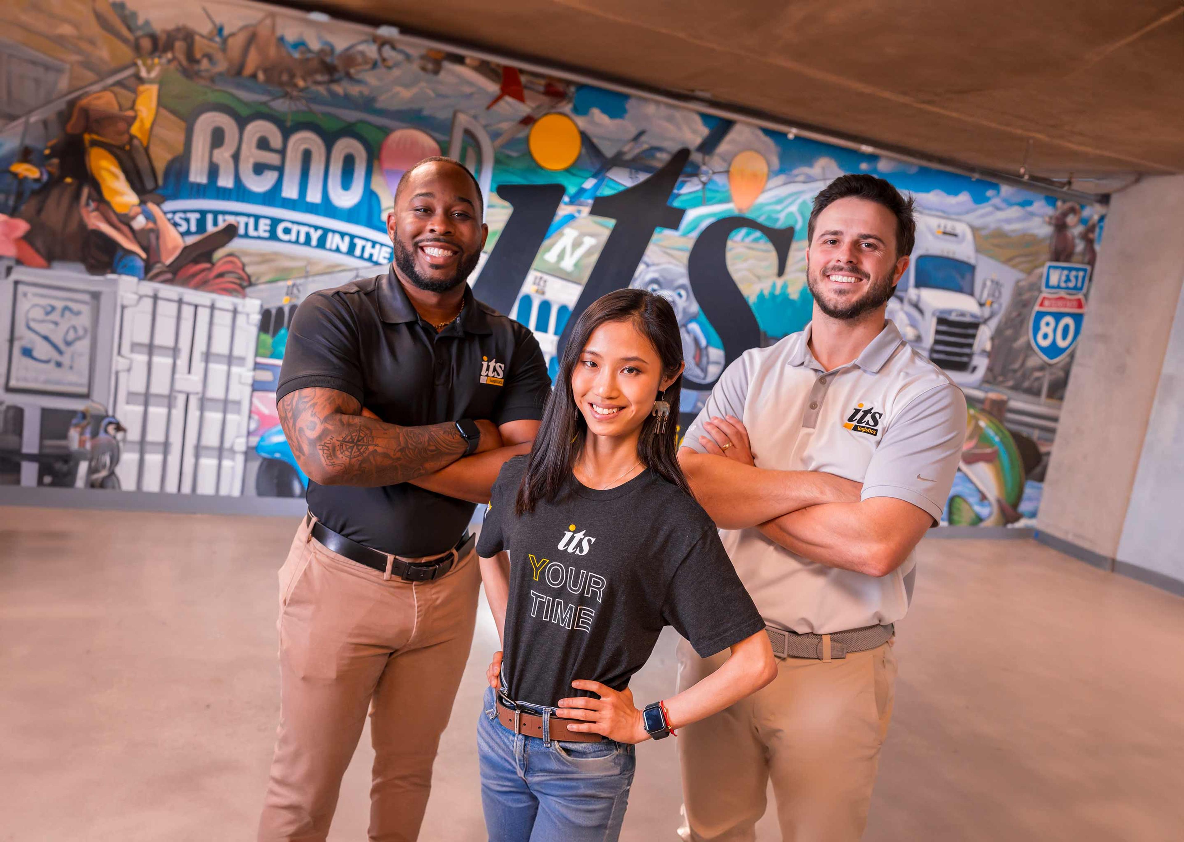 3 ITS Logistics employees posing for a picture
