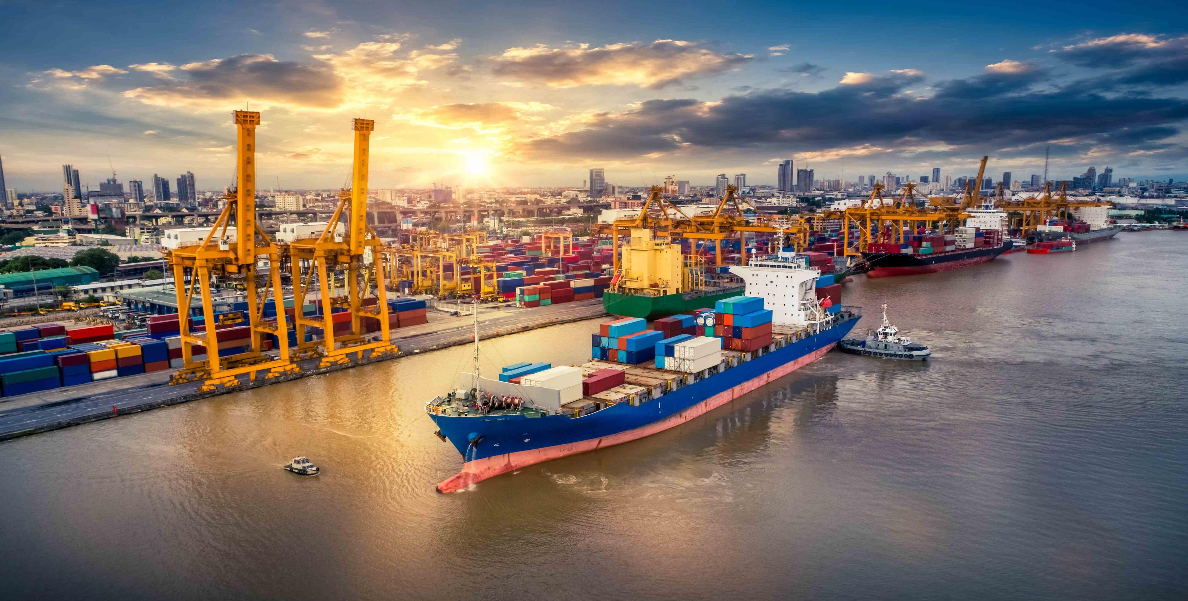 Intermodal transportation of Container Cargo ship and Cargo plane with working crane bridge in shipyard at sunrise