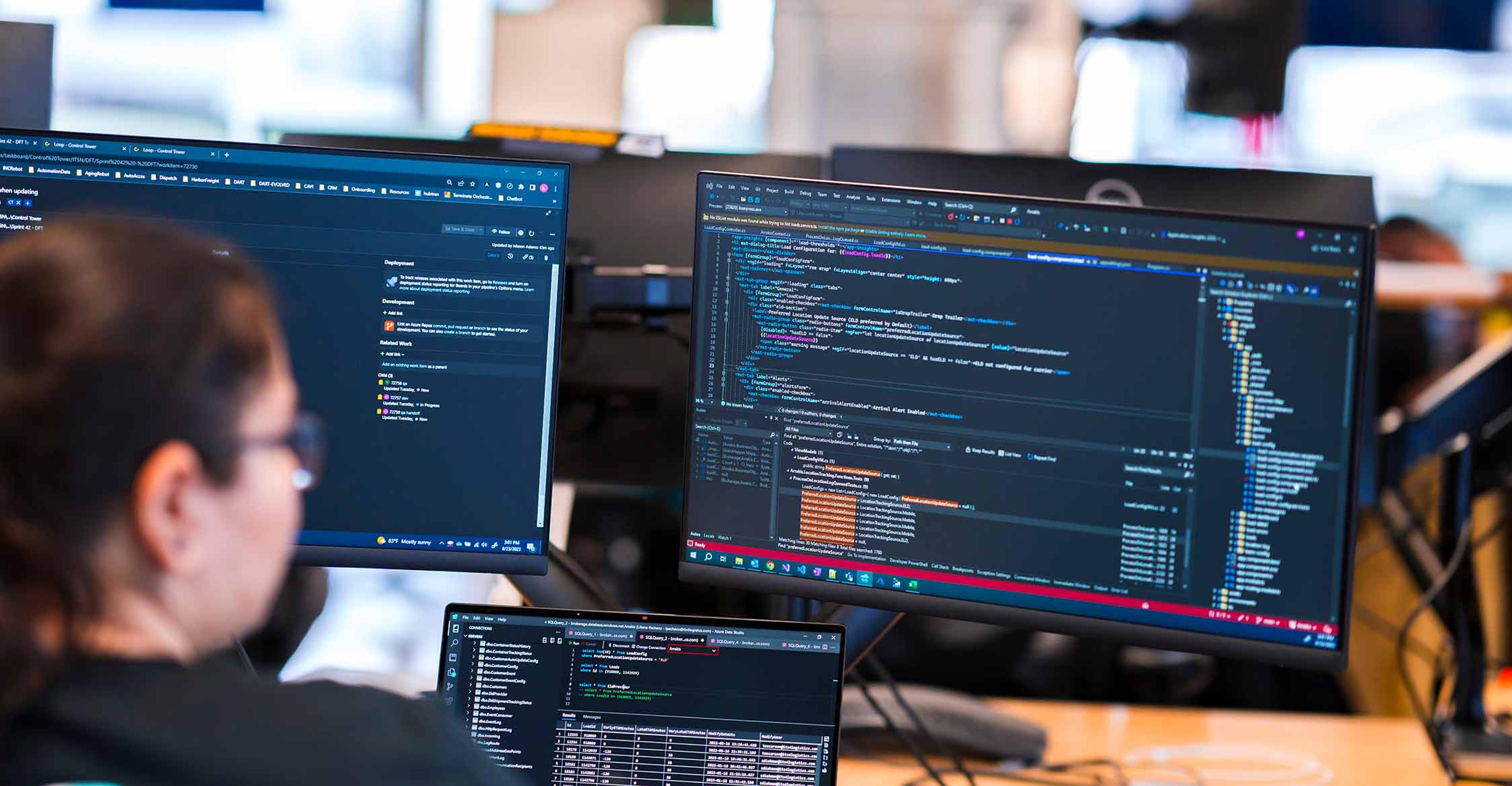 An ITS team member working on code.