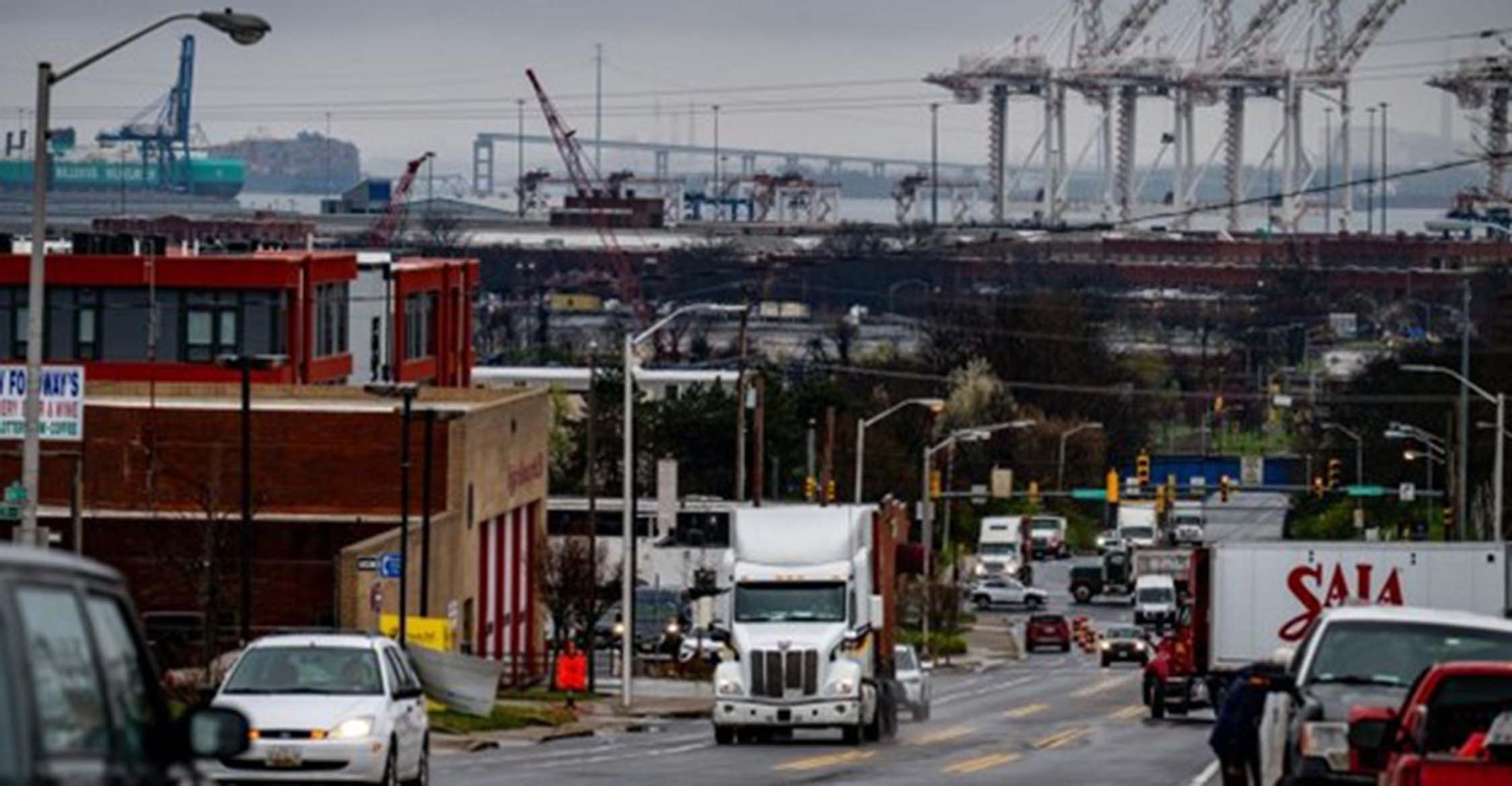 Trucks travel along Broening Highway near the entrance of the Port of Baltimore