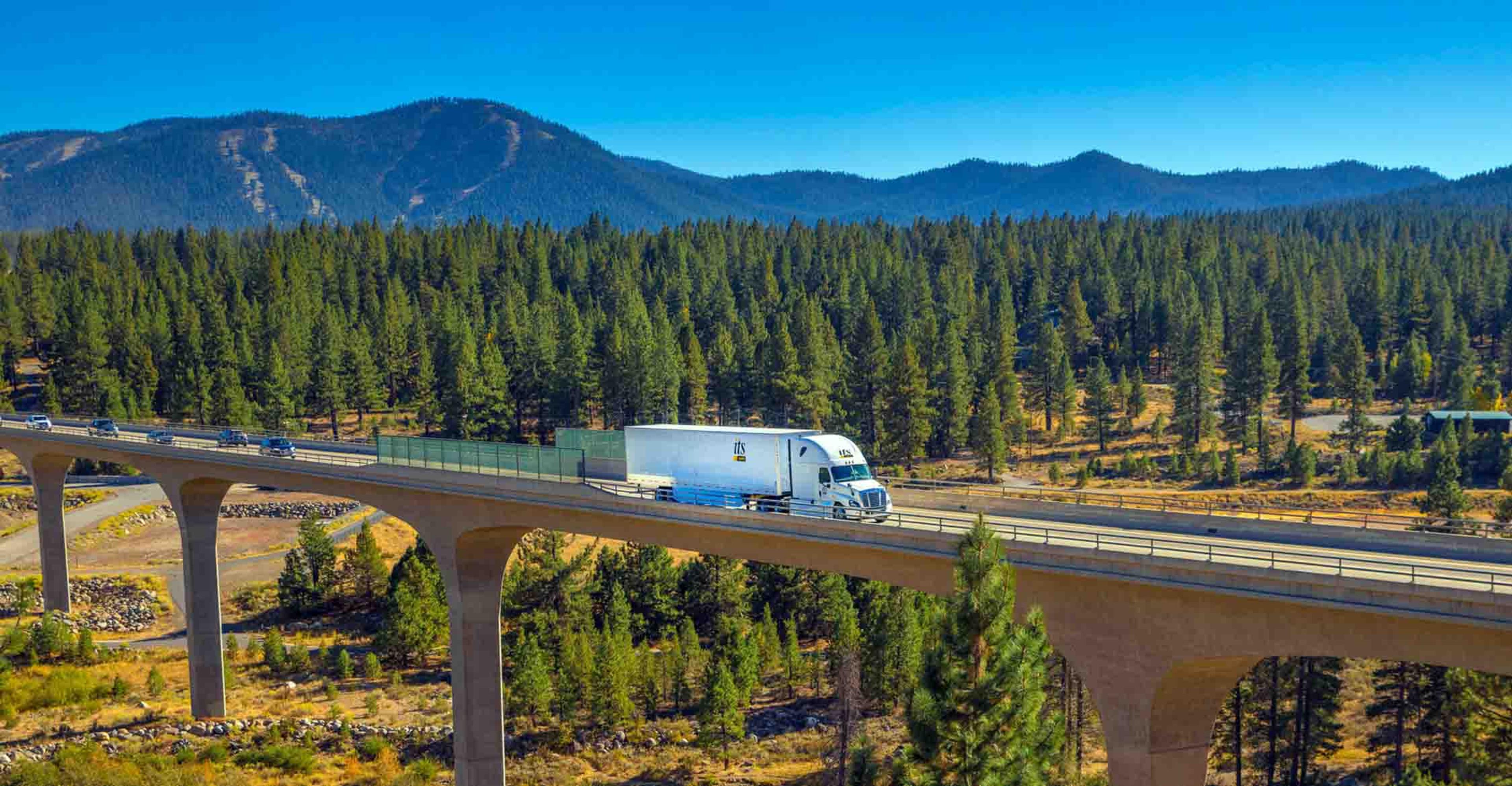 An ITS Truck driving across a bridge