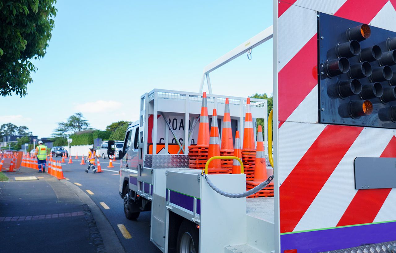 Traffic management truck and cones set up on a New Zealand road