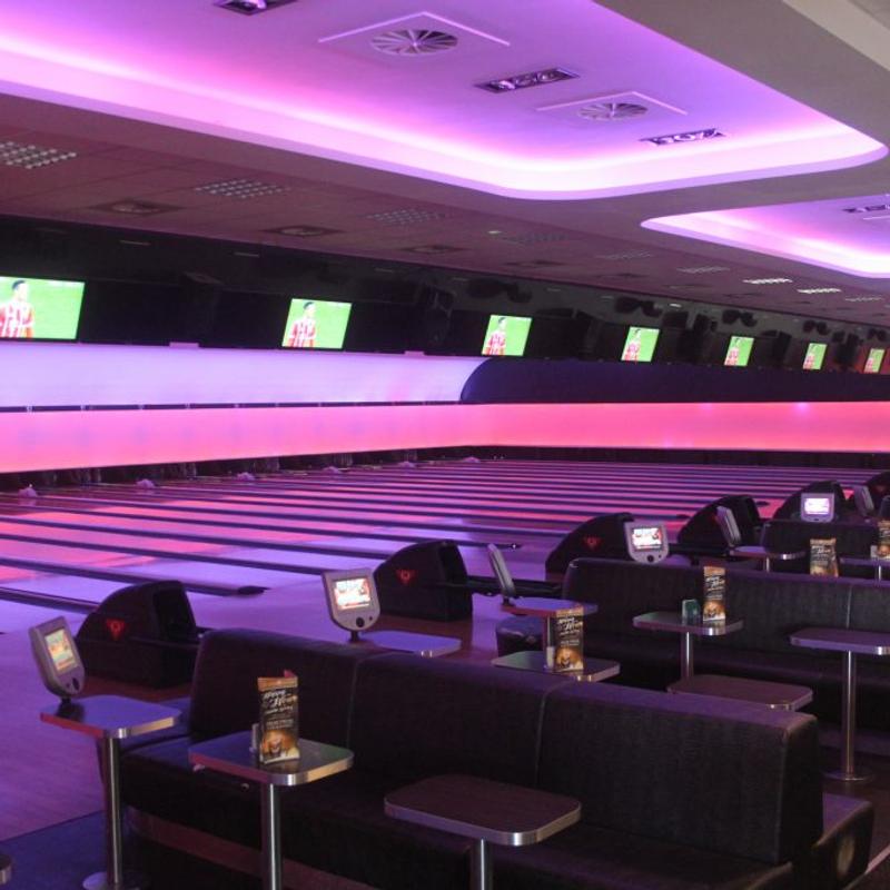 Shared seating beside the bowling lanes.