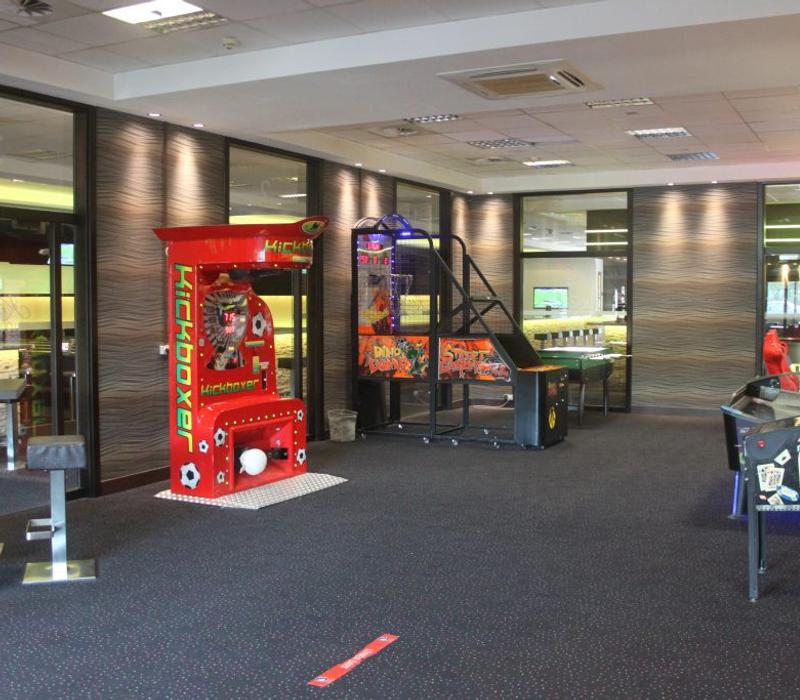 Arcade machines in the games area.
