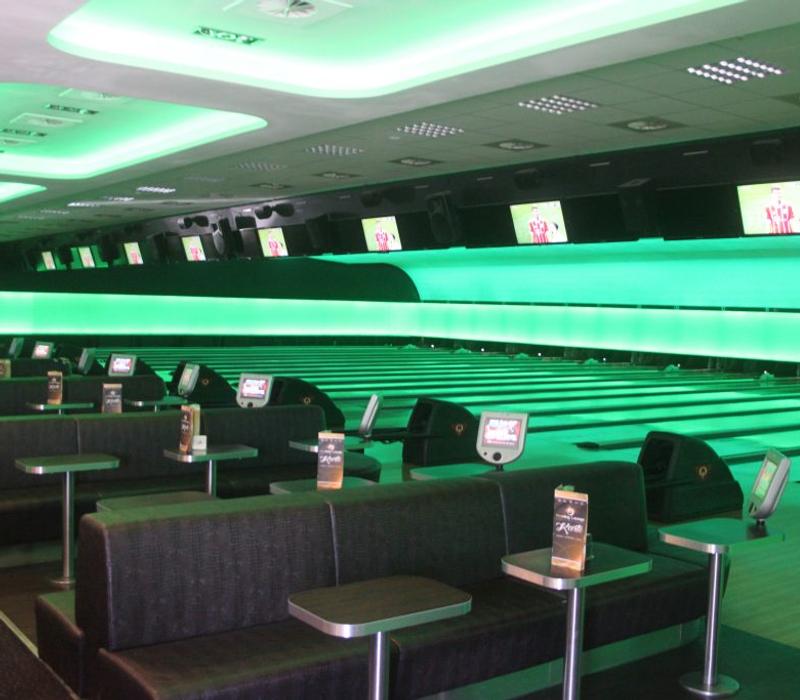 Green lighting at the bowling lanes.