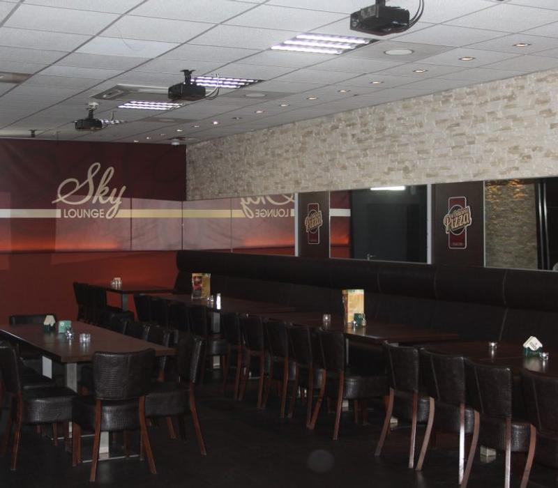 Tables and seating in the Sky Lounge.