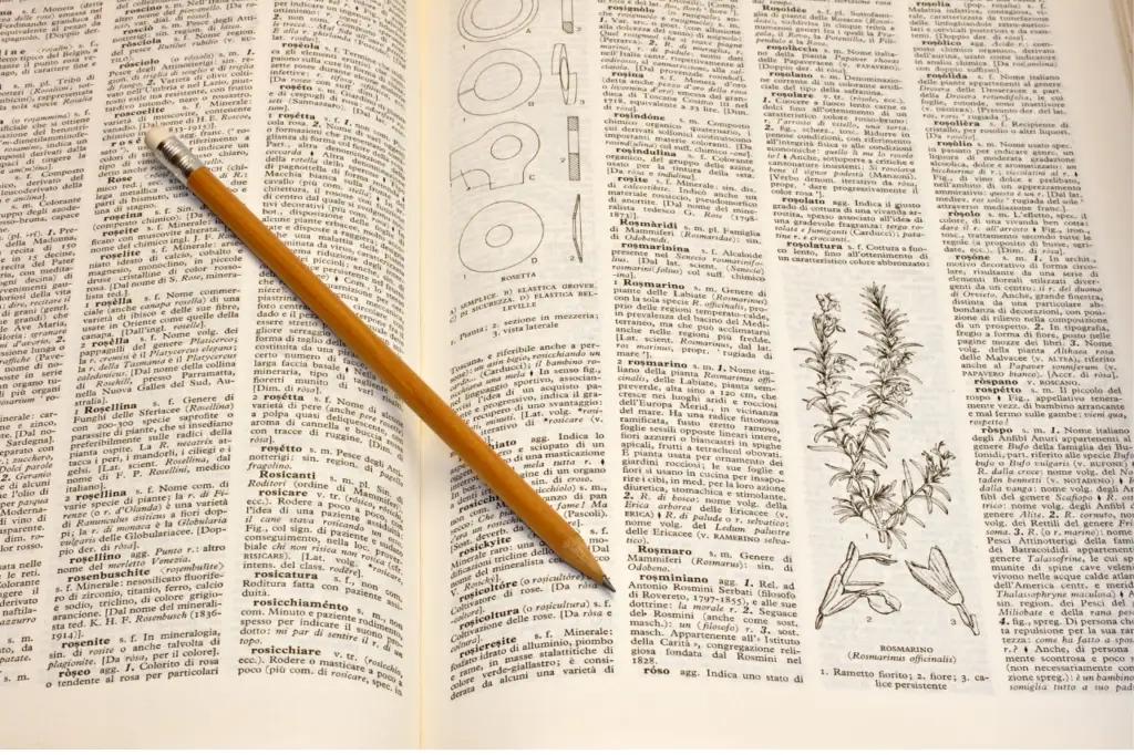 pencil on dictionary