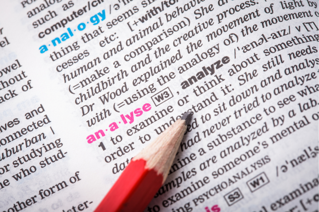 pencil on dictionary