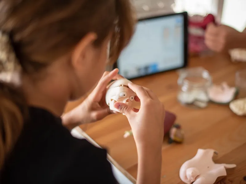 young girl learning human biology