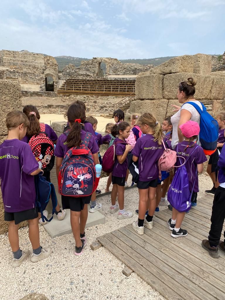 school group on educational trip to roman remains in southern Spain