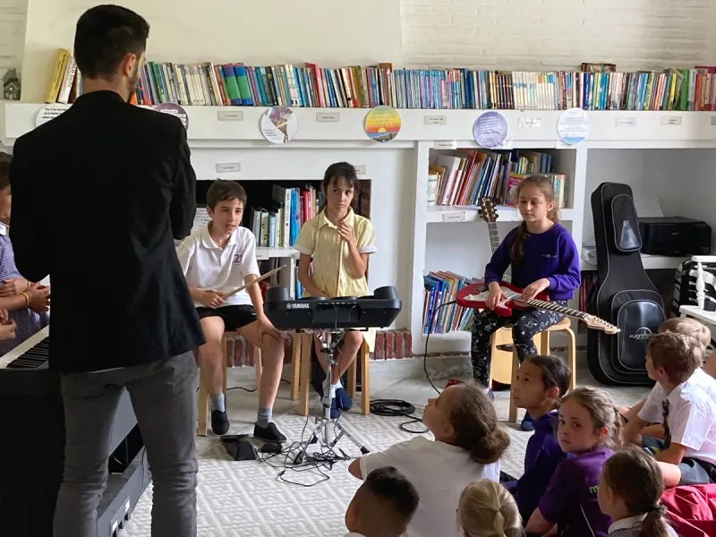 young children enjoying music session at school