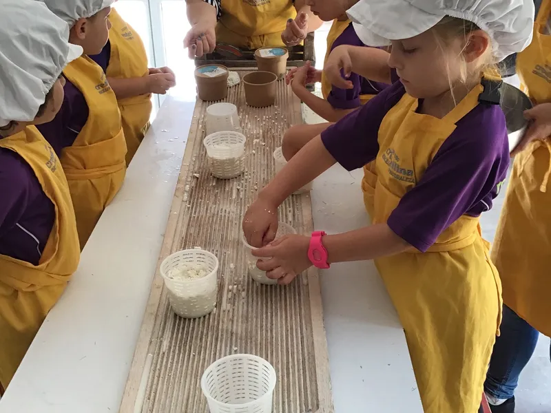 young kids enjoying chocolate making in Spain
