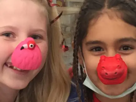 young girls with funny noses for red nose charity