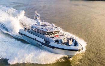 Military vessel sailing on the Thames | Pearl Marine