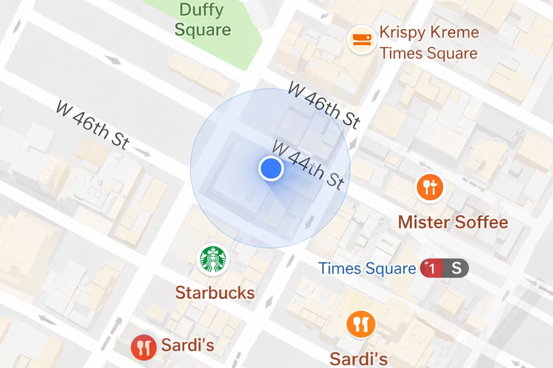 Map view showing a blue GPS location dot in Times Square, New York City