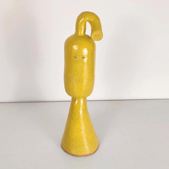 Yellow Creature with His Top Off ceramic sculpture