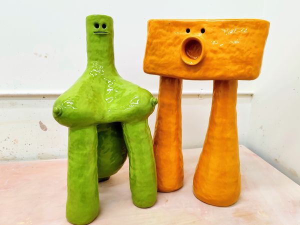 ceramic Green Creature and Orange Creature by Jen Wohlner