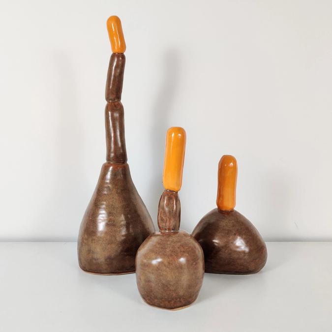 three ceramic Log Vases