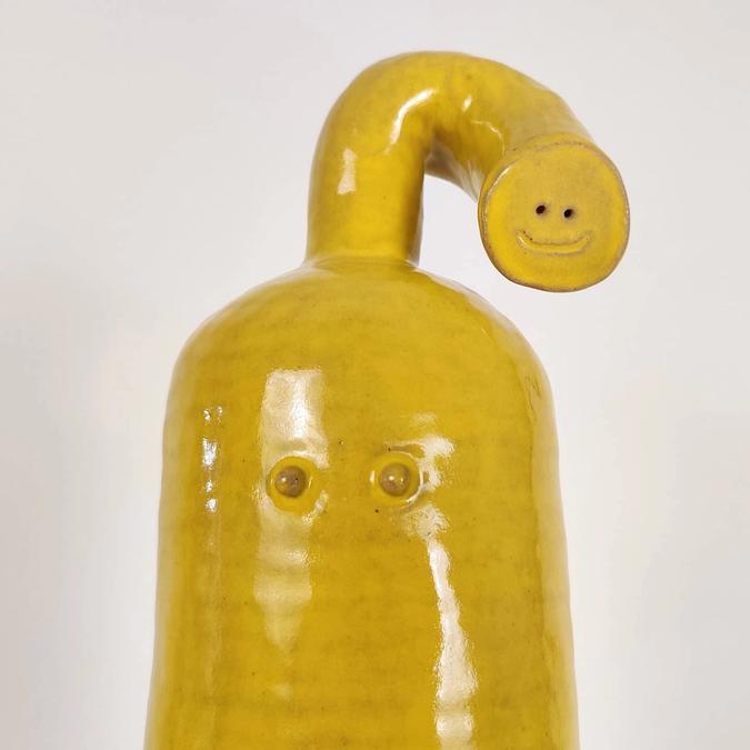 detail of Yellow Creature with His Top Off
