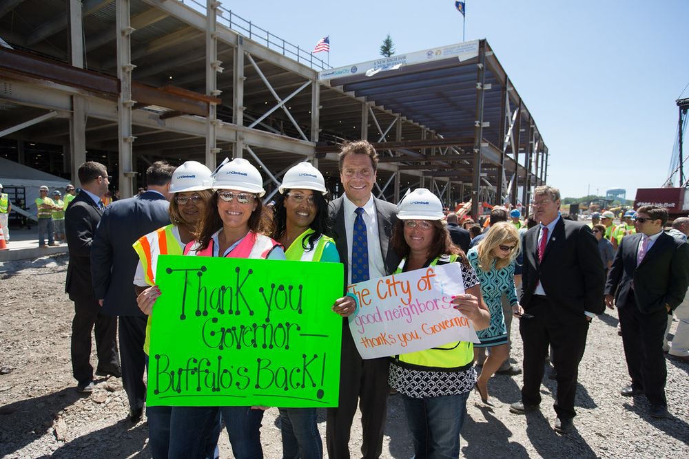 Cuomo next to some supporters