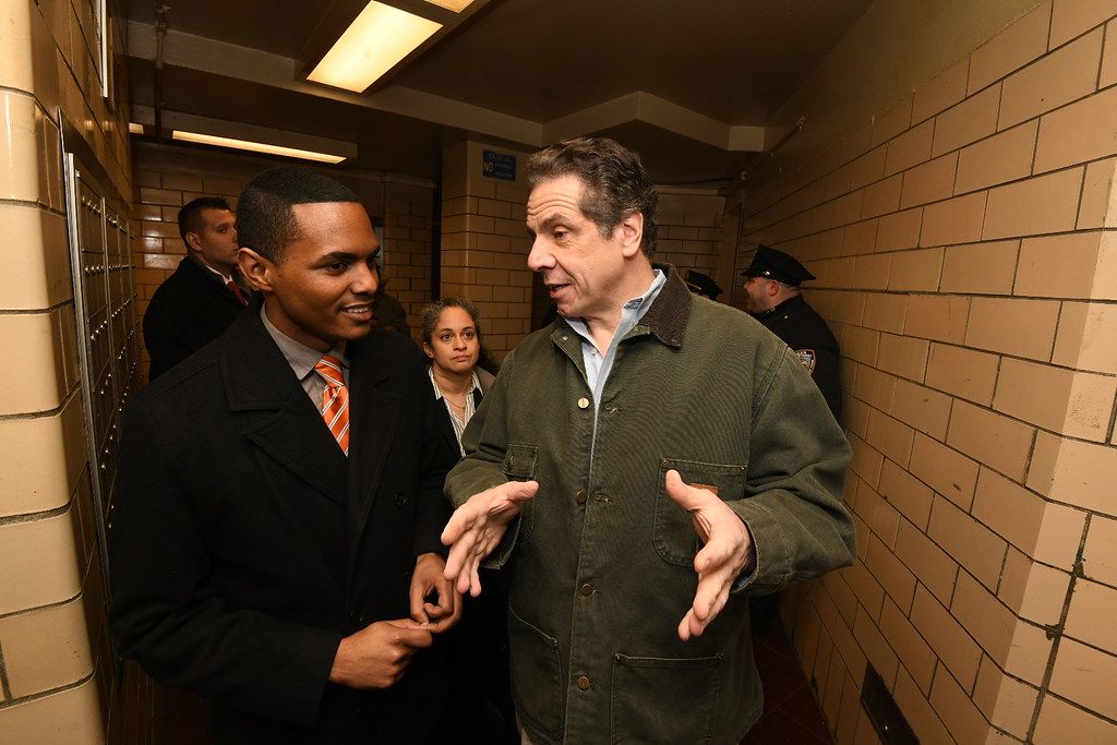 Andrew Cuomo and Ritchie Torres at a NYCHA complex