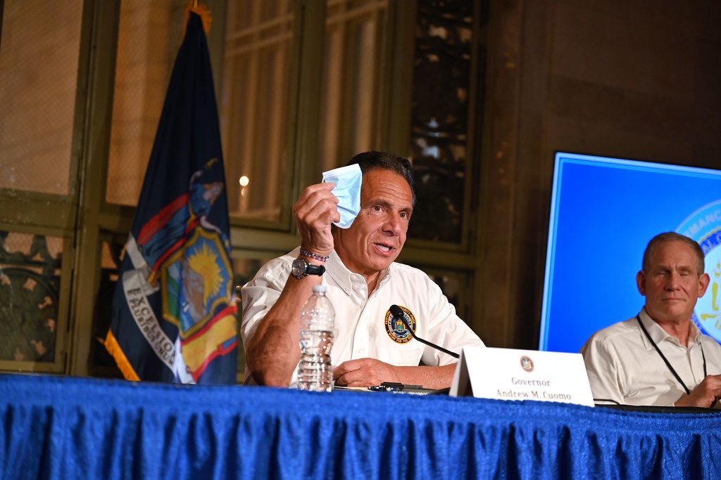 Cuomo demonstrating a mask