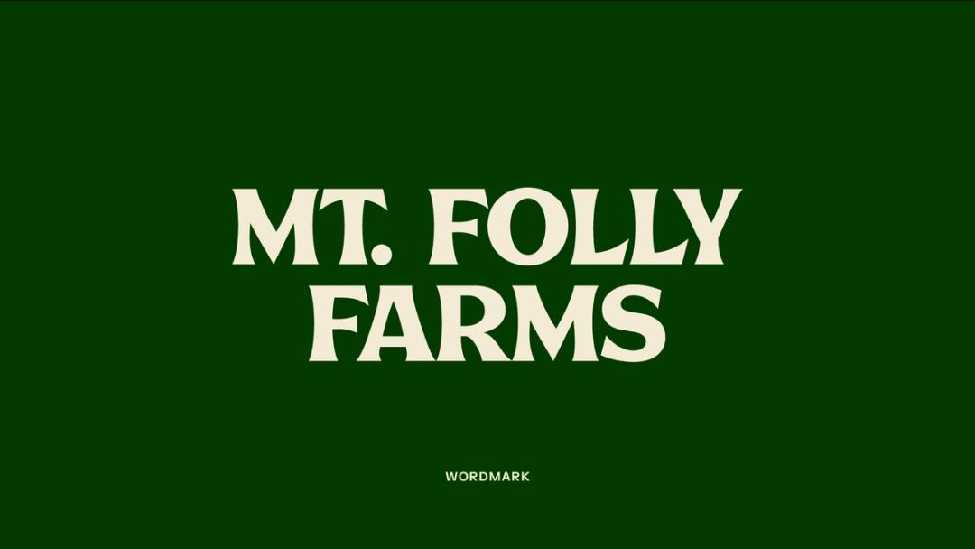 The words Mt. Follly farms, center aligned and stacked, in off-white, on a green background